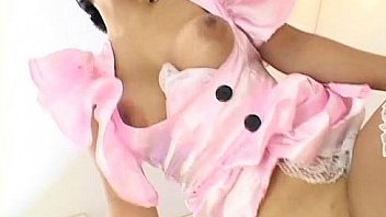 Asian bitch in pink get up and stockings gets doggy styled